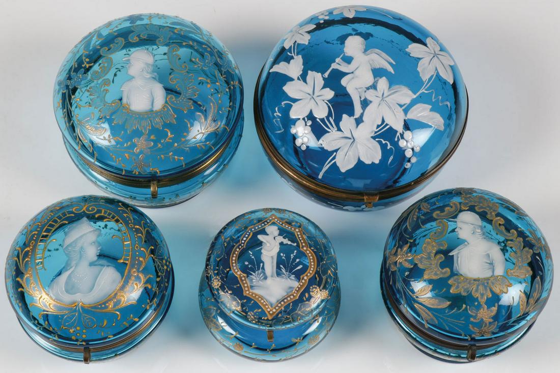 FIVE EXCEPTIONAL MARY GREGORY BOXES, C. 1900: FIVE EXCEPTIONAL MARY GREGORY BOXES, C. 1900. Comprising five sapphire blue Bohemian (AKA Mary Gregory) enamel decorated boxes of various shapes and sizes, each with hinged lid, all but one with exten