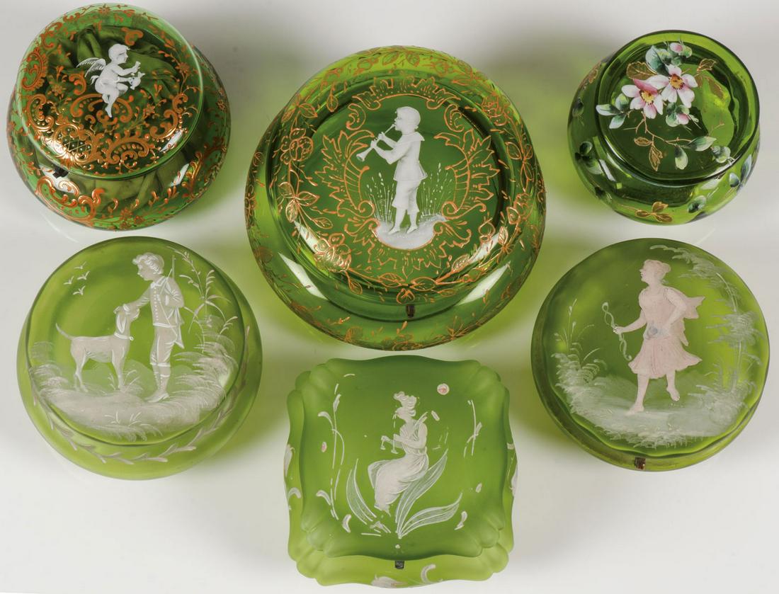 SIX MARY GREGORY GLASS BOXES: SIX MARY GREGORY GLASS BOXES. Comprising six individual Bohemian (AKA Mary Gregory) enamel decorated green glass boxes of various shapes and sizes. Three examples in satin glass, each with enameled hi