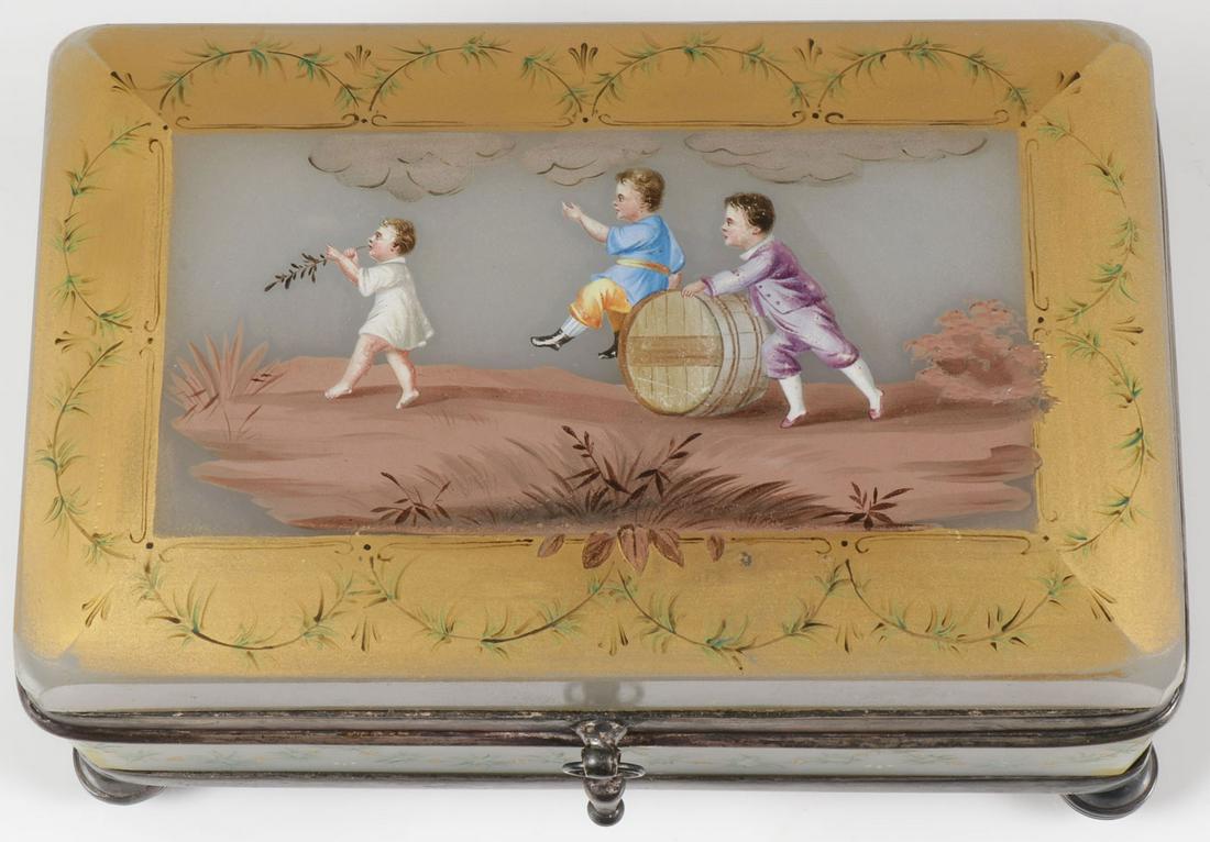 AN INTERESTING PAIRPOINT MOUNTED BOX: AN INTERESTING PAIRPOINT MOUNTED BOX. Comprising a heavy rectangular alabaster glass box, the hinged lid with beveled and rounded corners, finely painted in natural colors of children rolling a barrel