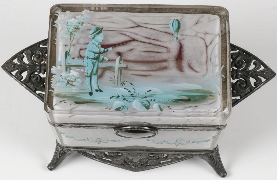 AN UNUSUAL MARY GREGORY BOX, C. 1890: AN UNUSUAL MARY GREGORY BOX, C. 1890. Comprising a Bohemian (AKA Mary Gregory) enamel decorated rectangular cased glass box in crackled finish with rounded corners, the hinged lid painted in blue tone