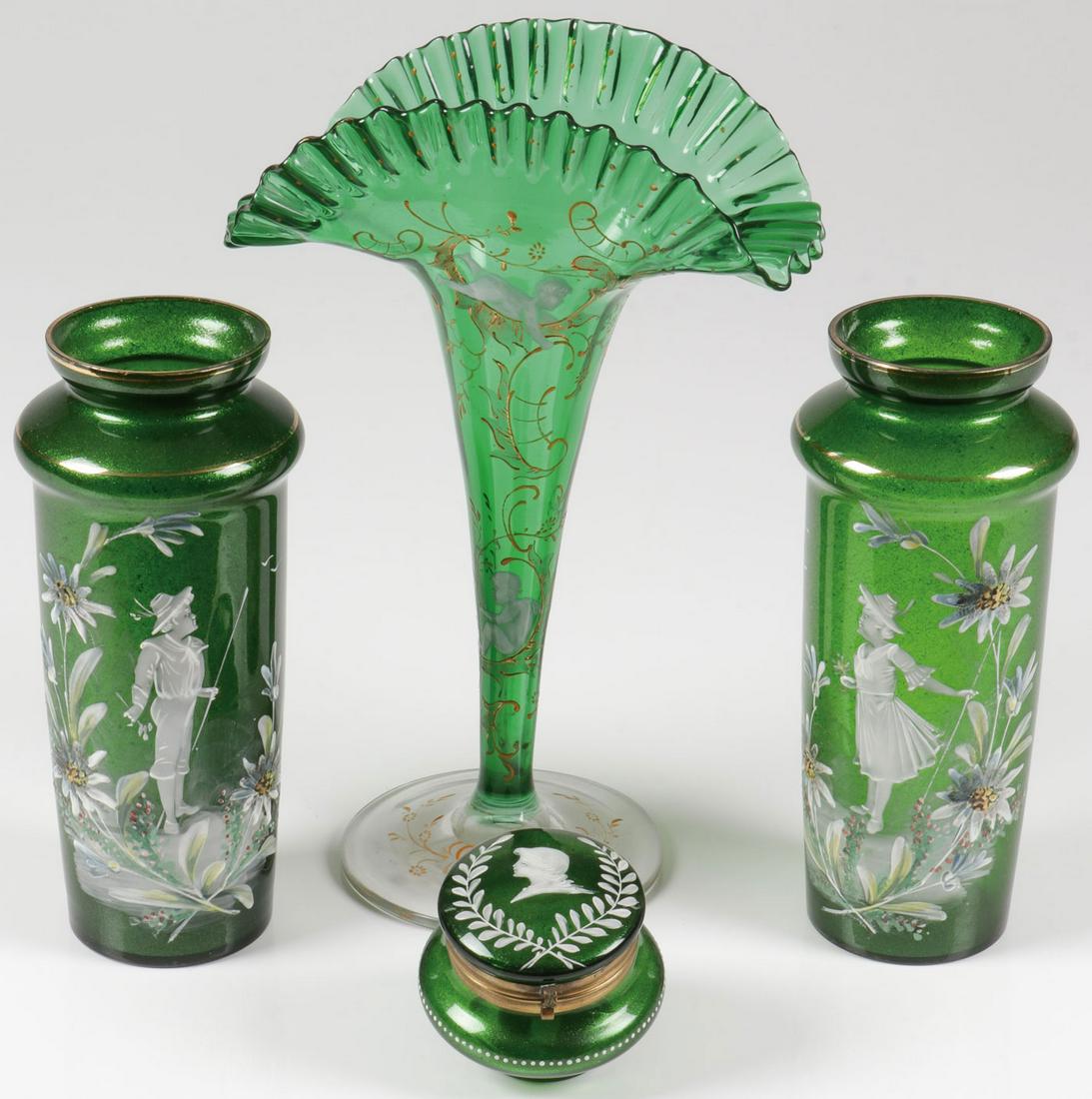 FOUR PIECES MARY GREGORY GLASS, C. 1900: FOUR PIECES MARY GREGORY GLASS, C. 1900. Comprising four individual pieces Bohemian (AKA Mary Gregory) enamel decorated emerald green glassware of various shapes and sizes, including a matching pair o