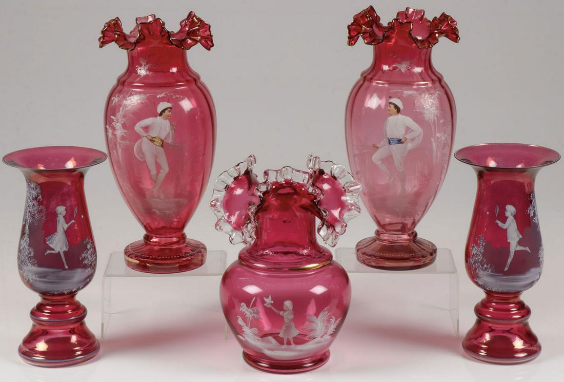FIVE PIECES MARY GREGORY CRANBERRY GLASS: FIVE PIECES MARY GREGORY CRANBERRY GLASS. Comprising five individual pieces of Bohemian (AKA Mary Gregory) enamel decorated cranberry glass including two pairs of matching vases, the largest with rib