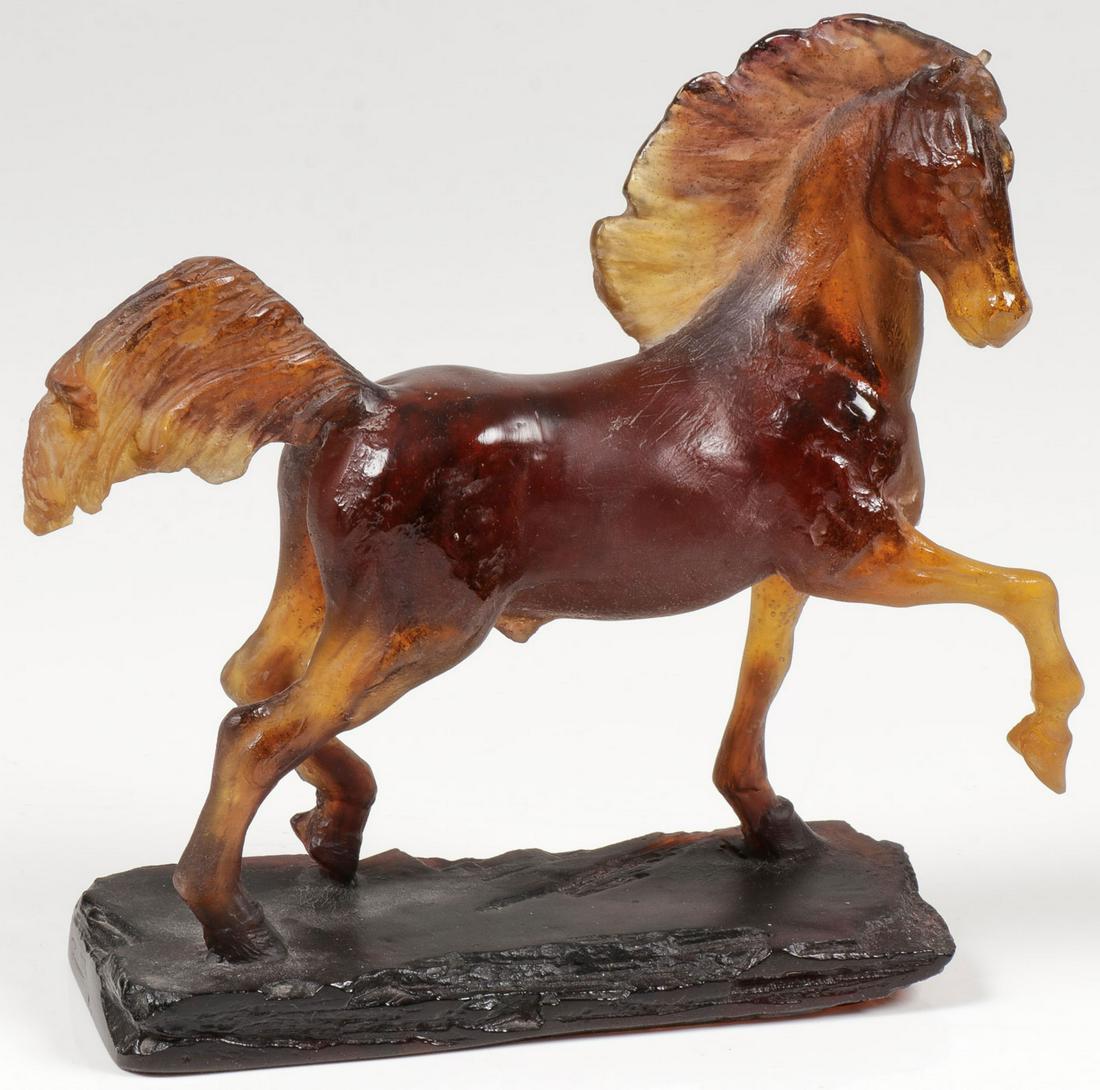 A FINE DAUM GLASS HORSE FIGURE: A FINE DAUM GLASS HORSE FIGURE. Comprising a finely modeled galloping horse in amber by Daum, inscribed, numbered, and dated on base DAUM, FRANCE, 2001, and 711/1000. Height 9.25 inches (23.5 cm), gre
