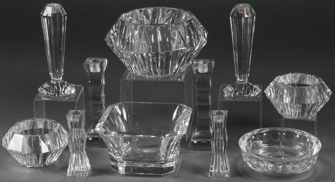 11 PIECES OF ORREFORS CRYSTAL: 11 PIECES OF ORREFORS CRYSTAL. Comprising a good group of large pieces including a large modern style bowl with two similarly designed accompanying bowls, and matching tapering candlesticks. As well a