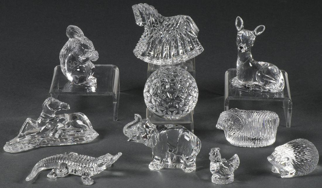 NINE WATERFORD CRYSTAL ANIMAL FIGURES: NINE WATERFORD CRYSTAL ANIMAL FIGURES. Comprising nine individual Waterford crystal animal figures, including a fawn, a foal, a squirrel, a sheep, rooster, elephant, alligator, hedgehog, and rocking h