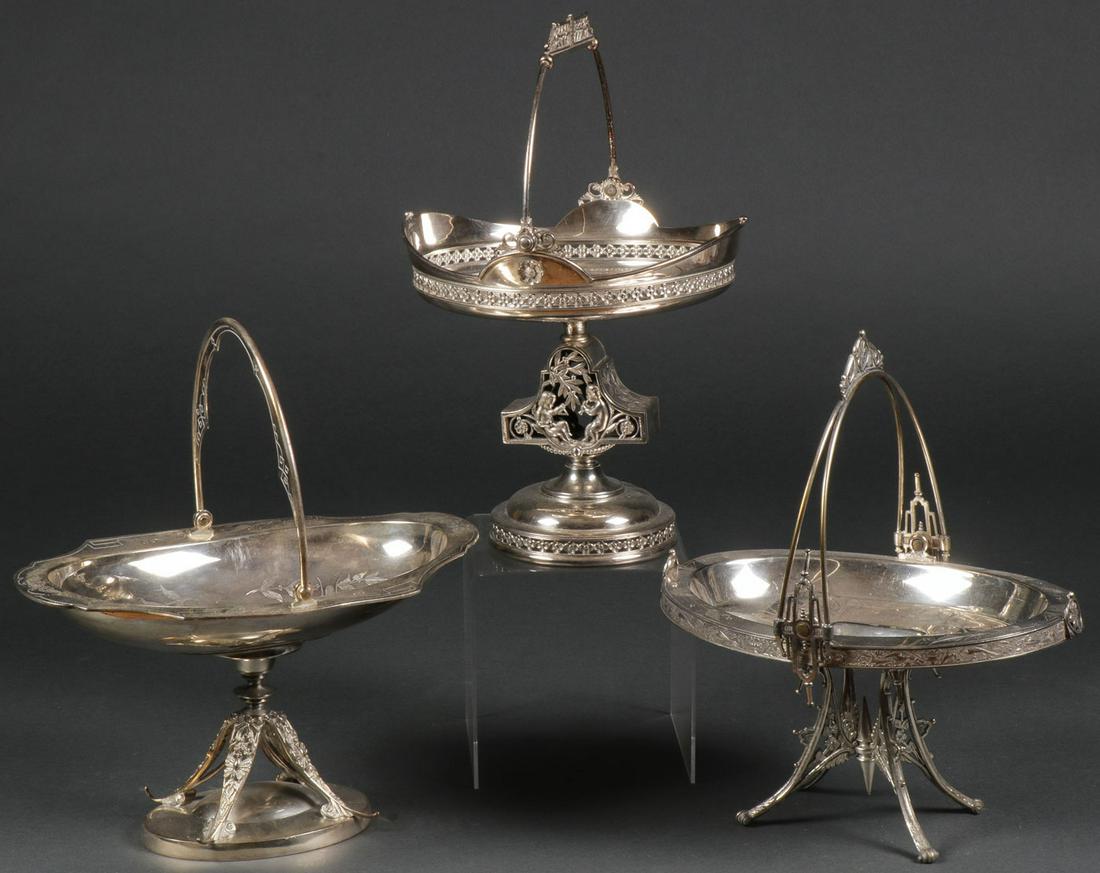 THREE FINE AESTHETIC SILVER-PLATED STANDS: THREE FINE AESTHETIC SILVER-PLATED STANDS. Comprising three individual highly decorative silver-plated stands, each with swivel handle in the aesthetic style, including a Simpson, Hall, & Miller (#167