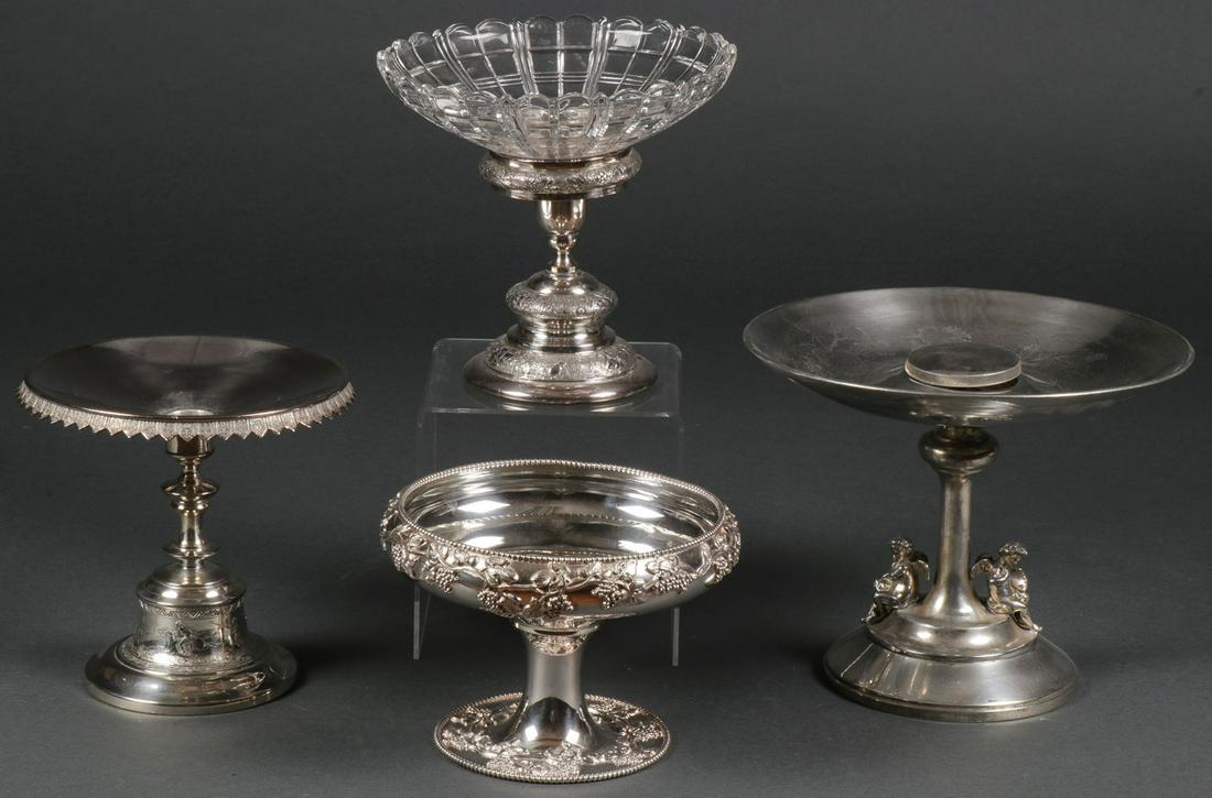 FOUR VICTORIAN SILVER-PLATED COMPOTES: FOUR VICTORIAN SILVER-PLATED COMPOTES. Comprising four individual footed compotes, one with glass insert, all finely decorated, one with grape pattern, one banded with Indians fighting buffalo, and on