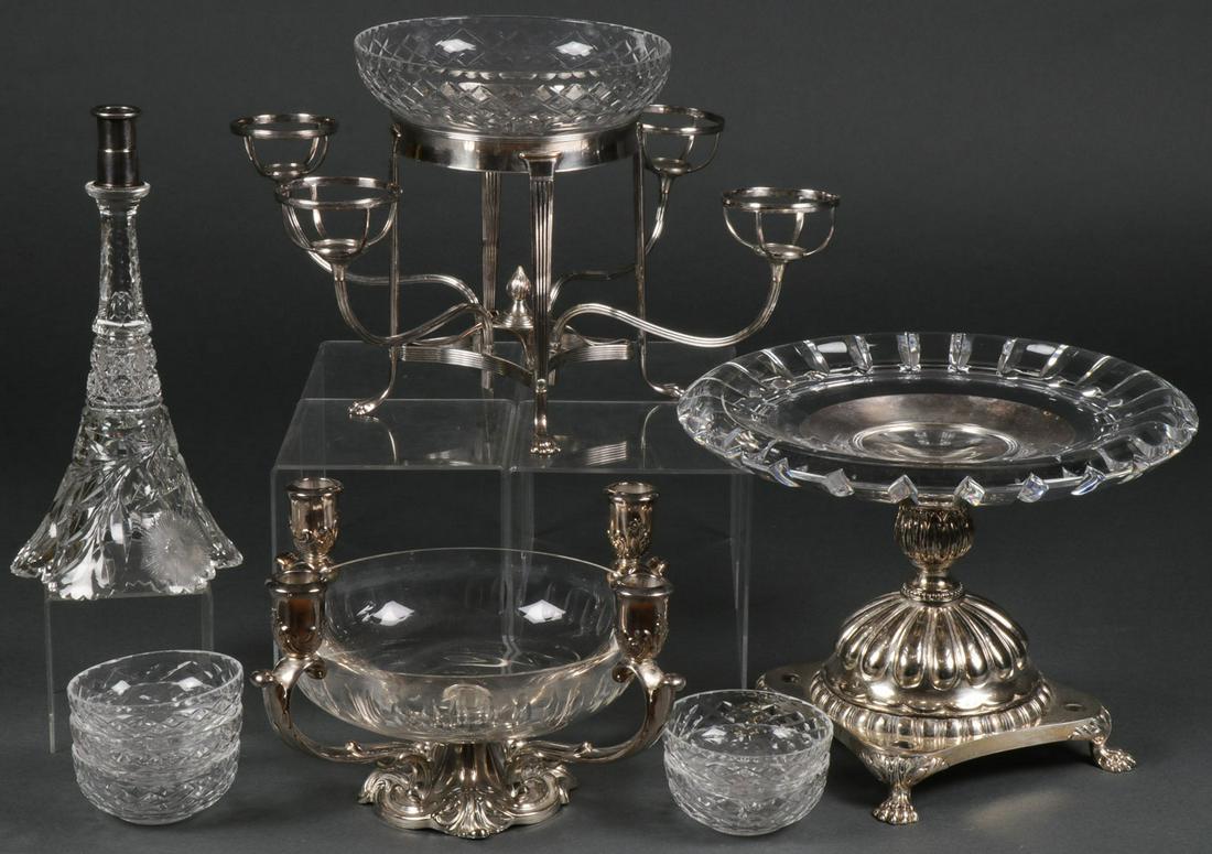 THREE CRYSTAL & SILVER-PLATE CENTERPIECES: THREE CRYSTAL & SILVER-PLATE CENTERPIECES. Comprising a large and heavy silver-plated centerpiece stand with paw feet and leaf tip bulbous central node supporting an Orrefors crystal bowl with shaped 