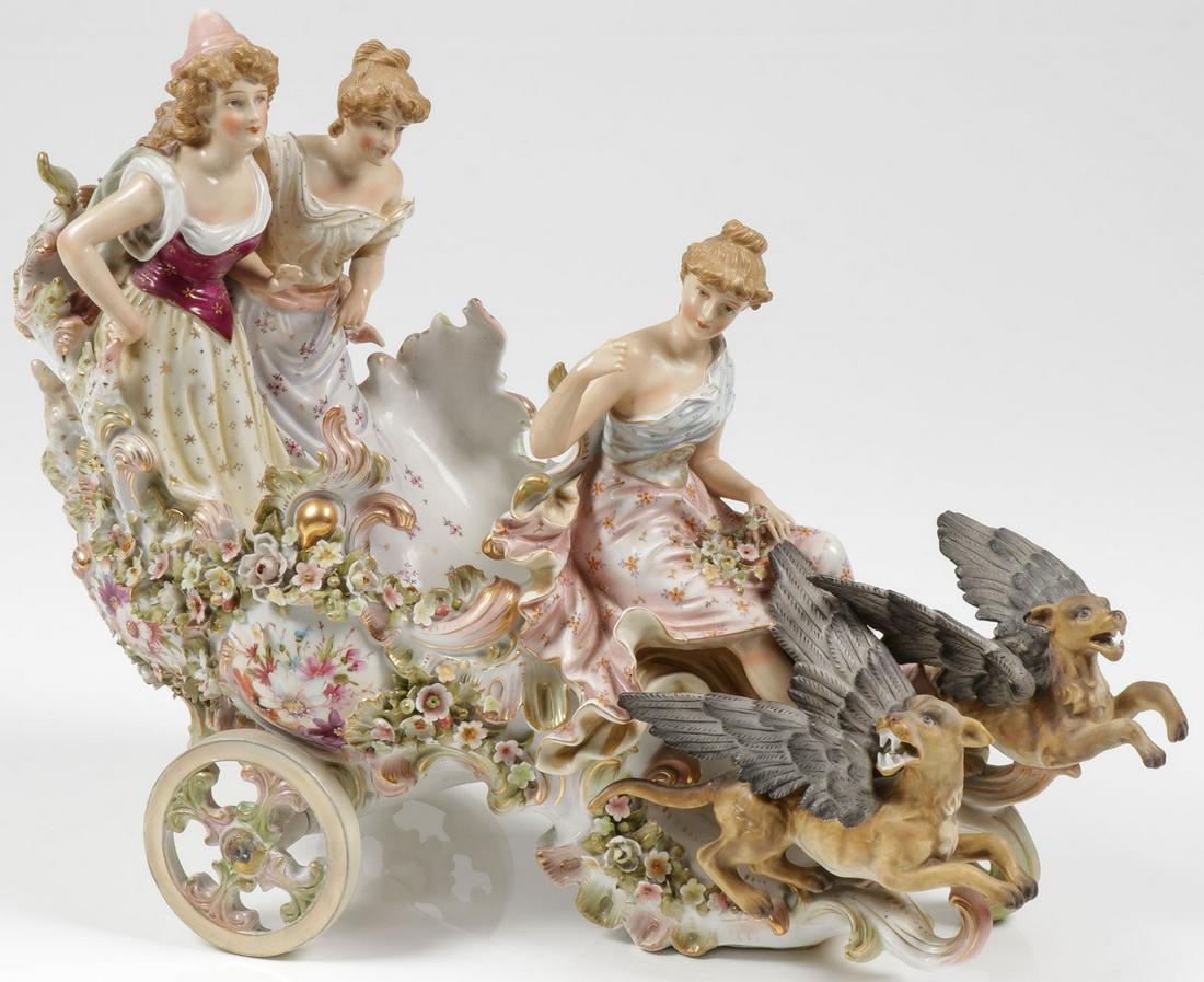 IMPRESSIVE FIGURAL PORCELAIN COACH, C. 1900: IMPRESSIVE FIGURAL PORCELAIN COACH, C. 1900. Comprising a large and impressive Dresden (likely Sitzendorf) floral decorated coach pulling three beautiful maidens driven by winged griffins. Apparently 
