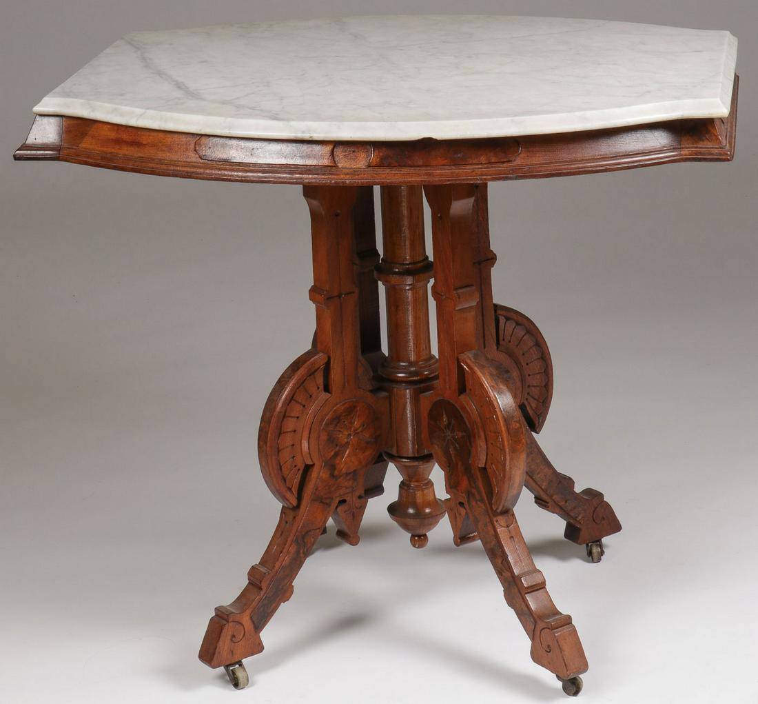 VICTORIAN WALNUT MARBLE TOP TABLES: VICTORIAN WALNUT MARBLE TOP TABLES. Comprising a pair of Victorian marble top tables, one with white shaped marble top, height 30 inches, the other with variegated pink rectangular top with notched co