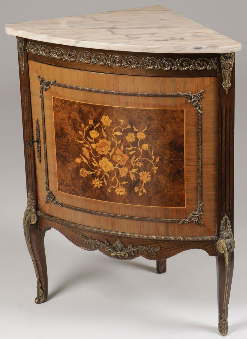 BRONZE MOUNTED FRENCH STYLE CABINET: BRONZE MOUNTED FRENCH STYLE CABINET. The triangular overhanging pink variegated marble top above a cupboard door centering a marquetry inlay of a blossoming floral spray with ormolu mounts. Height 33.