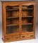 AN ATTRACTIVE AMERICAN OAK BOOK CASE