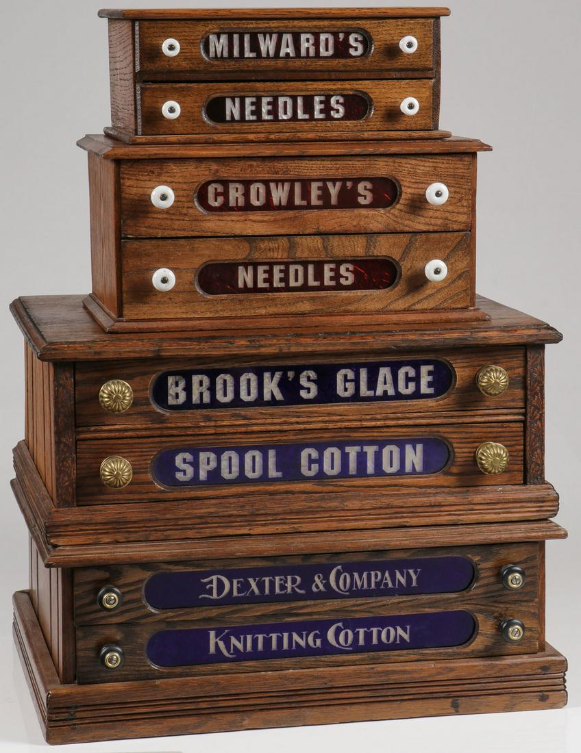 FOUR VINTAGE SPOOL & NEEDLE CASES: FOUR VINTAGE SPOOL & NEEDLE CASES. Comprising a Dexter & Company two-drawer cabinet, height 8 inches, width 21 inches, depth 15 inches. Together with a similar Brooks two-drawer cabinet with ribbed br