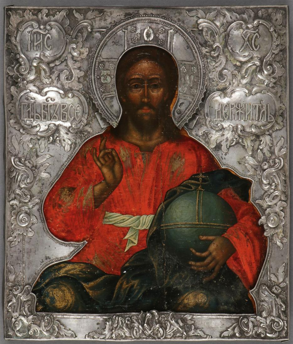 A ROCOCO RUSSIAN ICON OF CHRIST, 1779: A ROCOCO RUSSIAN ICON OF CHRIST, 1779. In this finely painted waist-up depiction, Christ is shown delivering a blessing and holding an orb, a symbol of His cosmic rule-based on Western imagery. The pa