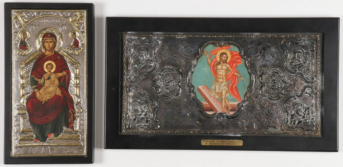 A PAIR OF CONTEMPORARY GREEK ICONS: A PAIR OF CONTEMPORARY GREEK ICONS. One depicting the Resurrection, overlaid with an ornate repousséd and chased riza depicting the four evangelists in each corner and contained in an ebonized wood f