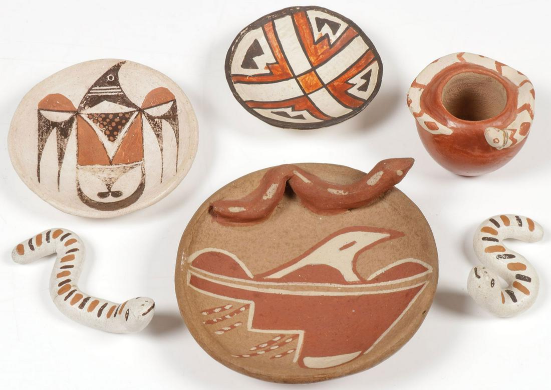 SIX PIECES ACOMA & OTHER SOUTHWEST POTTERY: SIX PIECES ACOMA & OTHER SOUTHWEST POTTERY. Including two Lucy M. Lewis signed snakes, greatest length 3.1 inches, two circular Acoma trays, together with a Lupe Loretto Lucero snake pot signed on bas