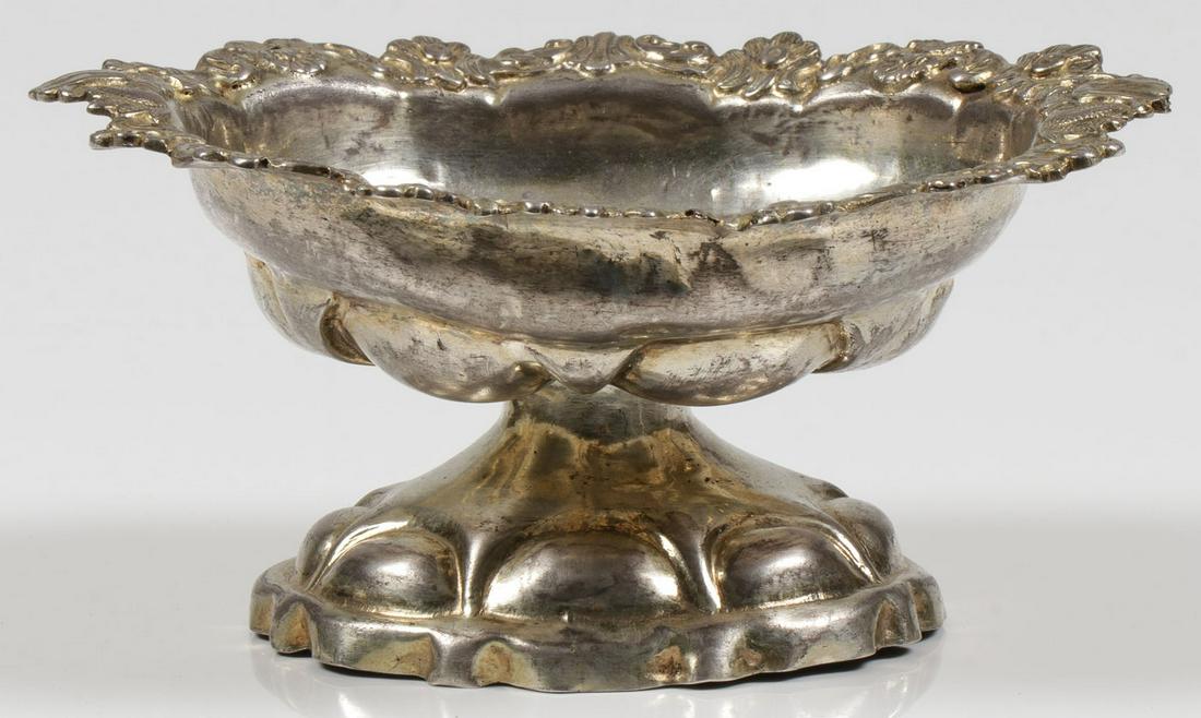 A RUSSIAN SILVER FOOTED SALT: A RUSSIAN SILVER FOOTED SALT. In the Rococo style, hallmarked Moscow, 84 standard, dated 1849 and with indistinguishable maker's mark. Height 2.1 inches (5.5 cm), width 4.3 inches (11 cm). SHIPPING NO