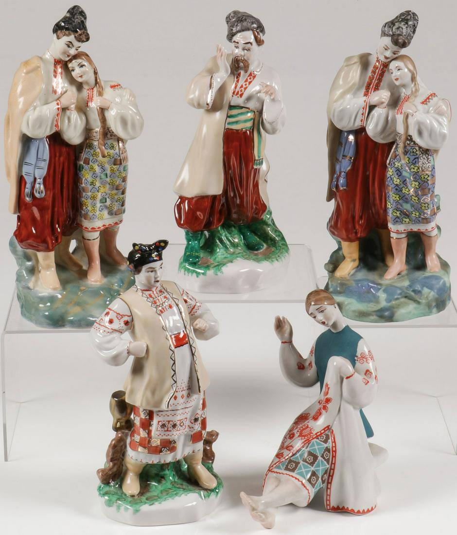 FIVE SOVIET RUSSIAN PORCELAIN FIGURES: FIVE SOVIET RUSSIAN PORCELAIN FIGURES. Comprising five individual porcelain figures in traditional Ukrainian costume, each marked on underside of base, greatest height 11 inches (28 cm). SHIPPING NOTI