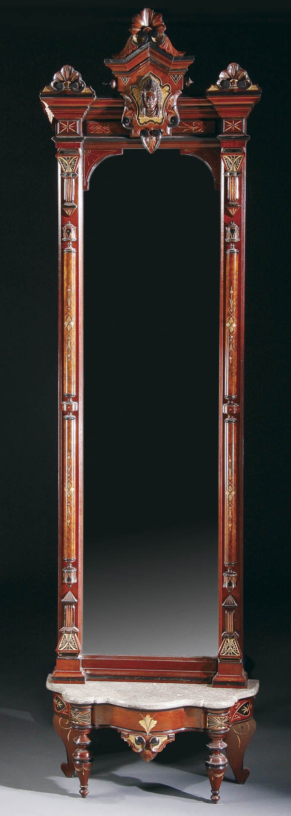 AN AMERICAN CARVED WALNUT PIER MIRROR