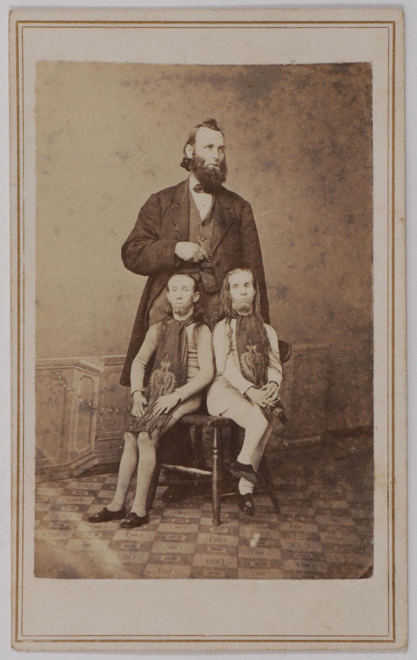WILD MEN OF BORNEO CDV: WILD MEN OF BORNEO CDV. Comprising an original Waino and Plutano CDV portrait of the sideshow "Wild Men of Borneo" circa 1870s/80s with trimmed margins and laid down. The CDV measuring 3.2 inches x 2.
