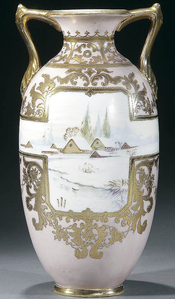 NIPPON JEWELED WINTER SCENIC PORCELAIN VASE: A GOOD NIPPON JEWELED WINTER SCENIC PORCELAIN VASE early 20th century, with snow covered cottages within a gilt scrolled lavender ground. Green "M in wreath" mark. Height 11.25 inches (28.5 cm). Estim