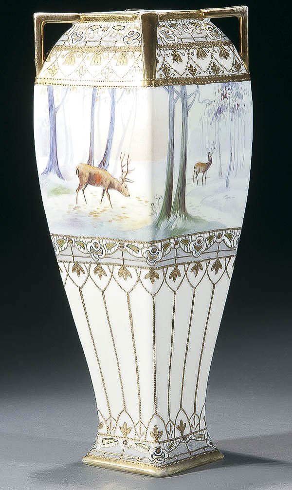 NIPPON DEER IN WINTER SCENIC PORCELAIN VASE: A FINE NIPPON "DEER IN WINTER" SCENIC PORCELAIN VASE early 20th century, square form with handles. Green "M in wreath" mark. Height 12 inches (30.5 cm). Estimate $250-$350