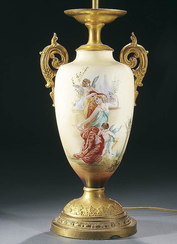 AN AMERICAN BELLEEK PORCELAIN LAMP/VASE circa 190: AN AMERICAN BELLEEK PORCELAIN LAMP/VASE circa 1900, painted on obverse and reverse with full-length scenes of a young beauty and cupids. Height 17.5 inches as illustrated. Estimate $200-$400