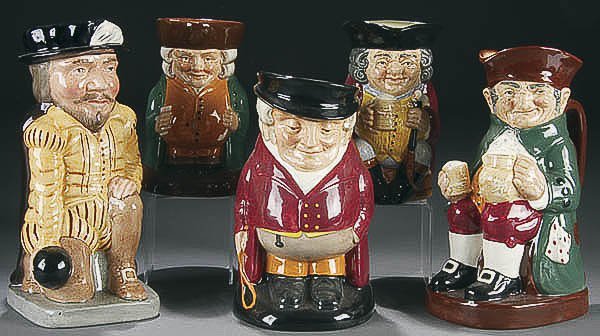 A ROYAL DOULTON TOBY JUG GROUP OF FIVE mid to lat: A ROYAL DOULTON TOBY JUG GROUP OF FIVE mid to late 20th century comprised of "Sir Francis Drake", "The Squire", "The Huntsman", "Jolly Toby", and "Old Charlie" all with green marks. Height 6-9 inches.