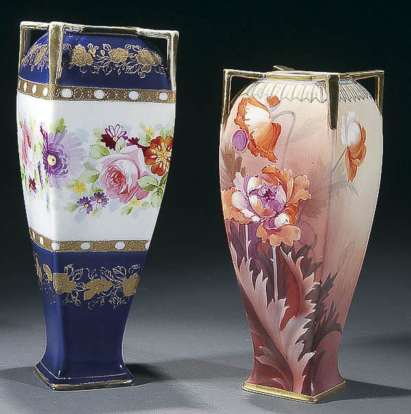 A PAIR OF NIPPON FOUR-HANDLED VASES circa 1910 co: A PAIR OF NIPPON FOUR-HANDLED VASES circa 1910 consisting of a cobalt and floral decorated vase and a floral decorated vase with satin finish. Both with raised gilt and green "M and wreath" mark. Heig
