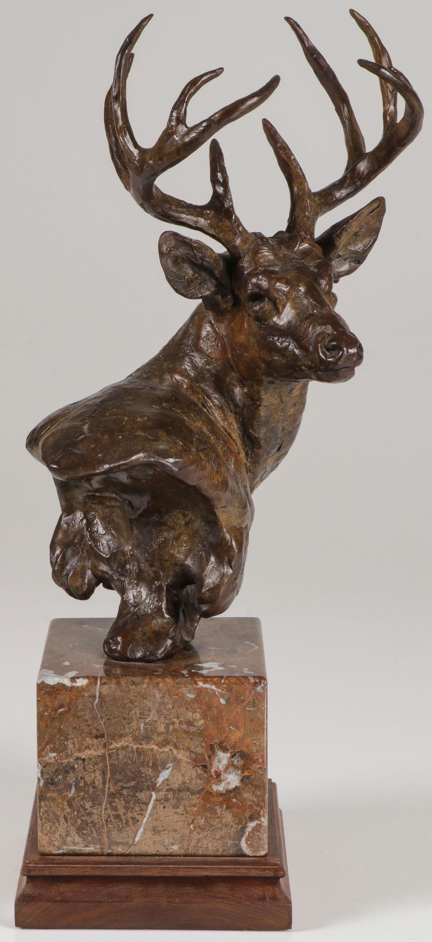 GREAT SHINABARGER BRONZE WHITETAIL BUCK: TIM SHINABARGER (American b. 1966-) In the Buck Brush - 2006 Bronze with brown patina on polished stone base Signed on base, dated and numbered 8/40 Overall height 19.5 inches