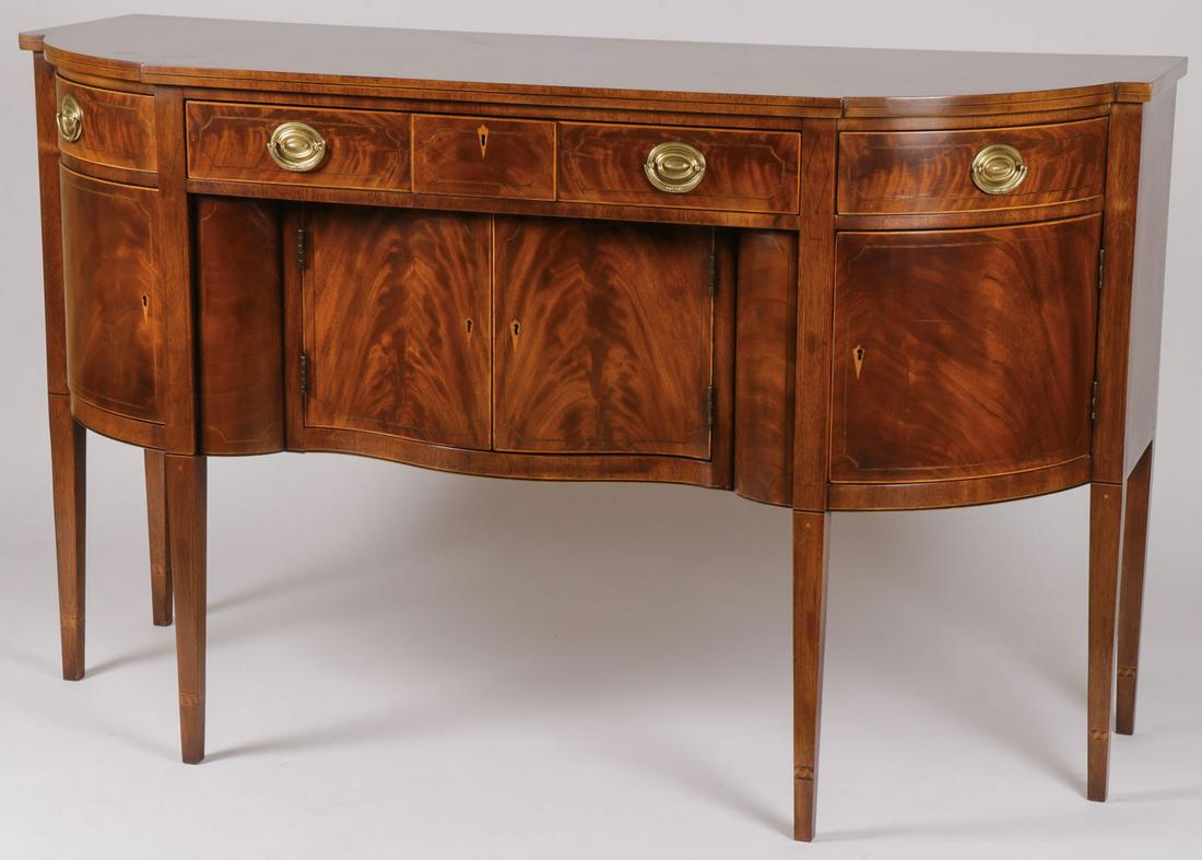A HENREDON NATCHEZ SHERATON SIDEBOARD: A HENREDON NATCHEZ SHERATON SIDEBOARD. In flame mahogany on tapered legs in very fine condition. Height 39.75 inches, width 65.25 inches, depth 25.75 inches. SHIPPING NOTICE: Jackson's is