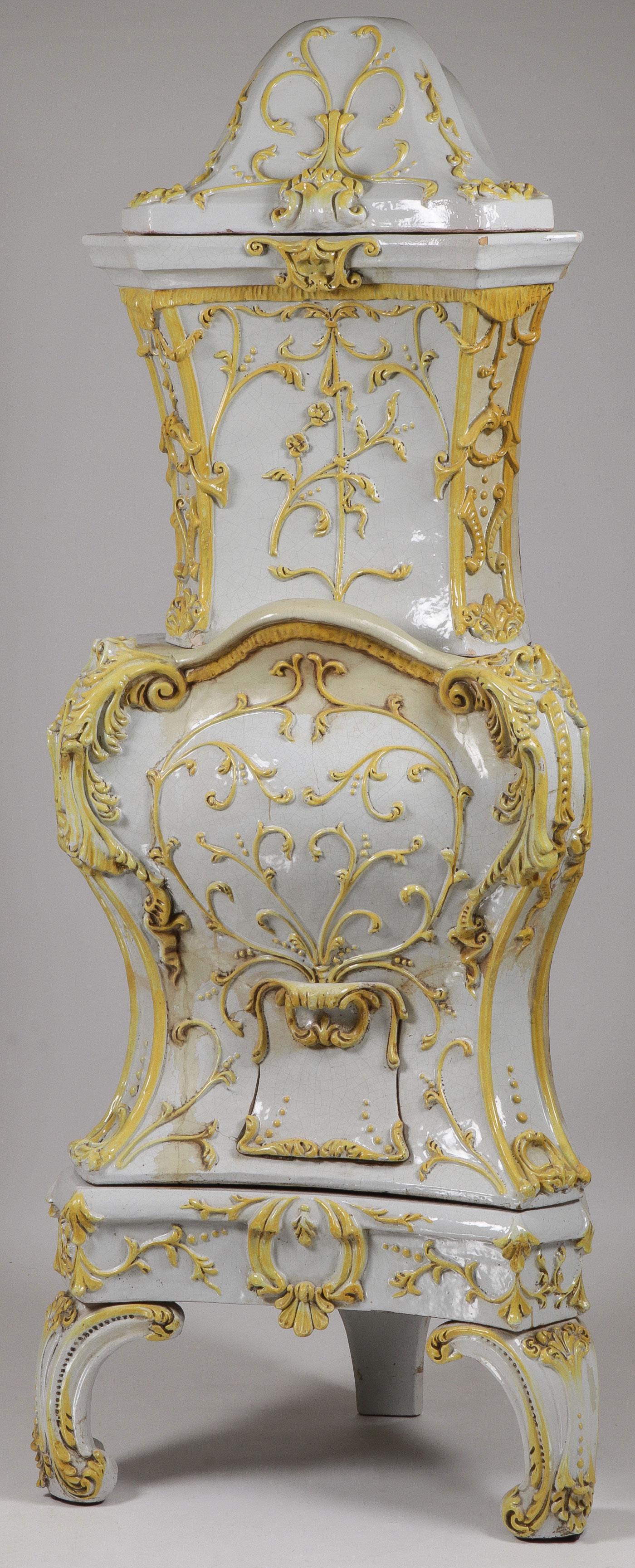 IMPRESSIVE ROCOCO GLAZED PARLOR STOVE: IMPRESSIVE ROCOCO GLAZED PARLOR STOVE. Comprising a large and impressive, glazed ceramic Kachelofen, probably Austrian, 19th century in the Rococo style. Consisting of four stacking sections, resting 