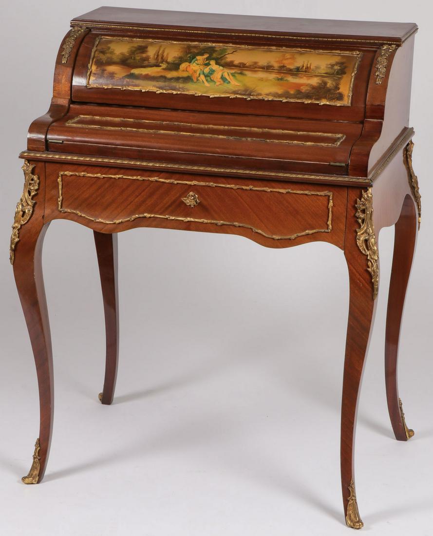 DIMINUTIVE FRENCH LADIES DESK: DIMINUTIVE FRENCH LADIES DESK. Comprising an ornate veneered and ormolu mounted ladies writing desk, pull-out drawer activated retractable cylinder top and fold-out writing surface. The interior with 