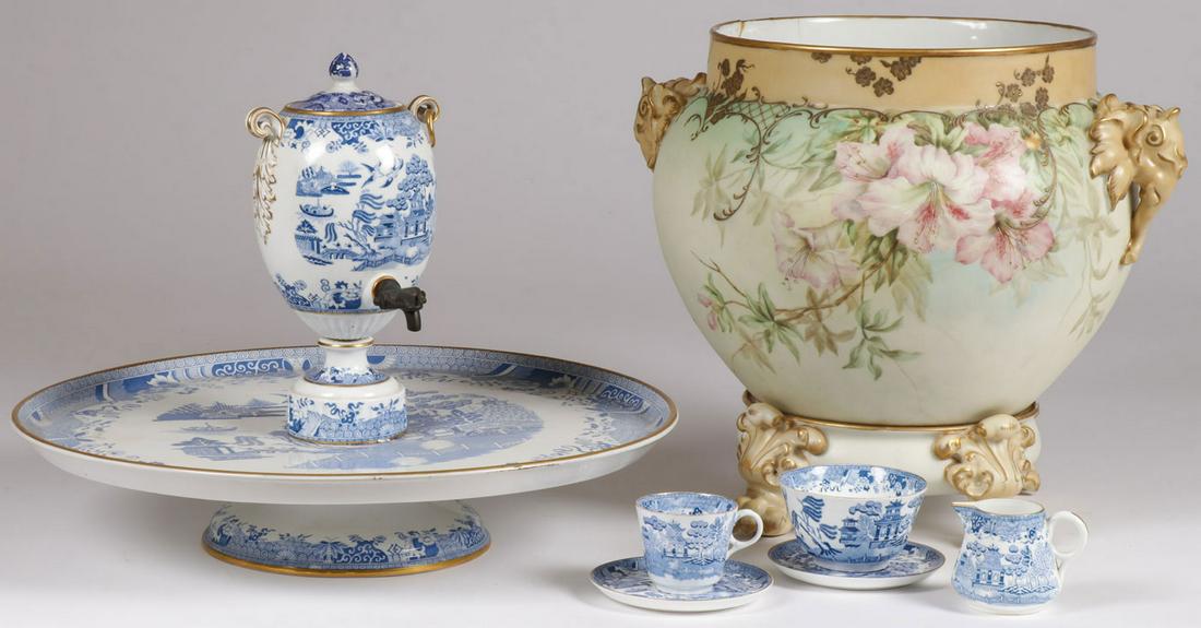 FRENCH AND ENGLISH PORCELAIN GROUP: FRENCH AND ENGLISH PORCELAIN GROUP. Comprising a Copeland blue and white urn form partial tea service on lazy Susan stand with creamer, two cups, two saucers and fitted lid. Diameter 18 inches. Togeth
