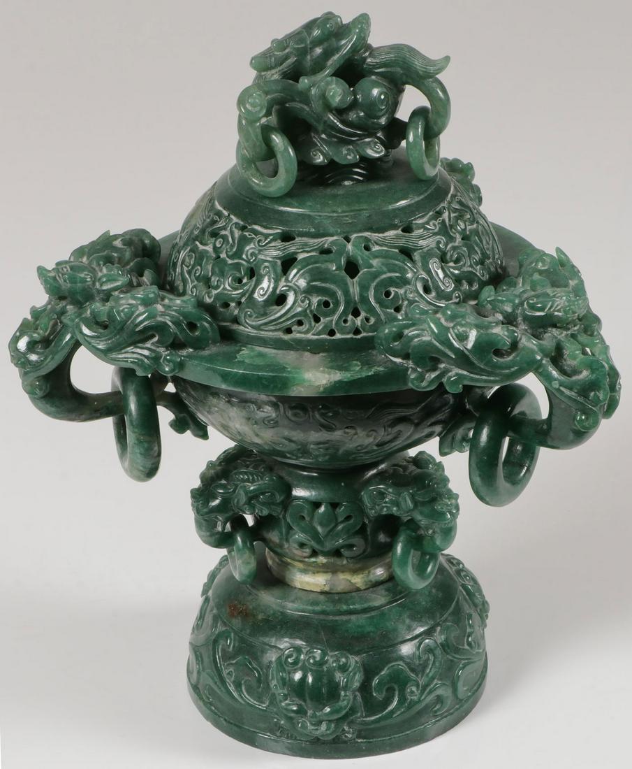 A CHINESE CARVED HARDSTONE CENSER: A CHINESE CARVED HARDSTONE CENSER. Of traditional form, with pierced lid and dragon finial. Height 10.75 inches (27.3 cm). SHIPPING NOTICE: Jackson's is your sole and only source for one