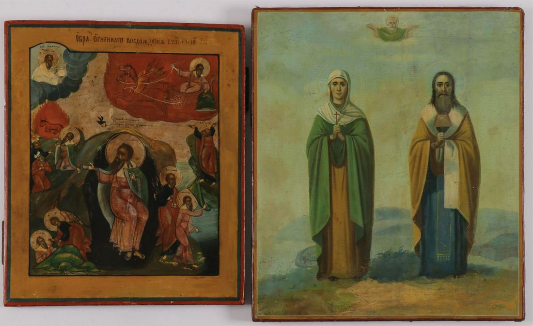 A PAIR OF RUSSIAN ICONS, 19TH C: A PAIR OF RUSSIAN ICONS, 19TH C. Comprising an icon depicting the Fiery Ascension of the Prophet Elijah and related scenes, 12.25 inches x 10.25 inches (31 x 26 cm). Together with an icon of two saint