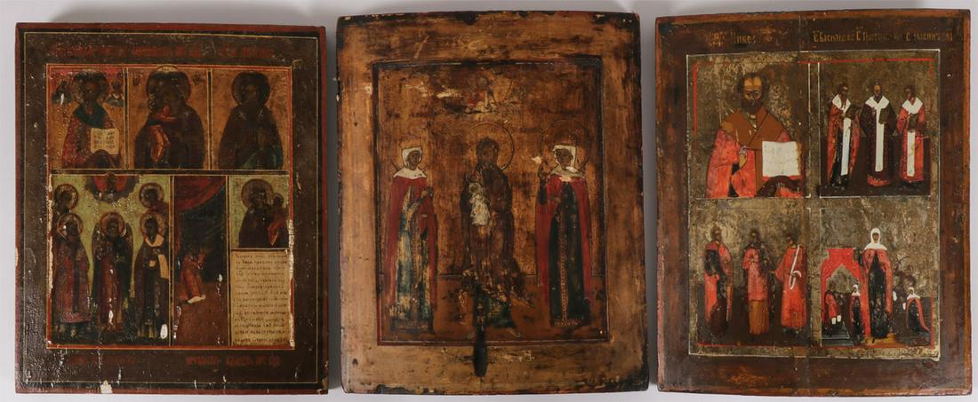 THREE RUSSIAN ICONS, 19TH CENTURY: THREE RUSSIAN ICONS, 19TH CENTURY. The first icon in five registers, the upper margin depicting Saint Nicholas, the Feodorovskaya Mother of God, and Saint Antipas, at lower left the Archangel Michael 