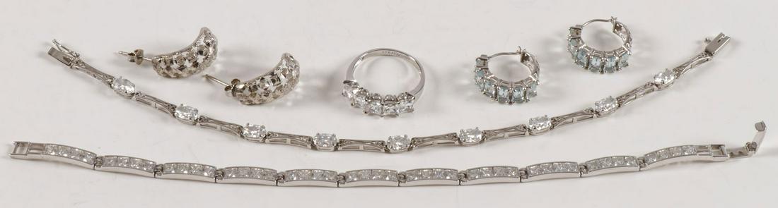 LOVELY GROUP GOLD JEWELRY: LOVELY GROUP GOLD JEWELRY. Comprising a good group of 14 karat white gold jewelry set with various precious and semi-precious gemstones as shown (none diamond) including two elegant tennis bracelets, 