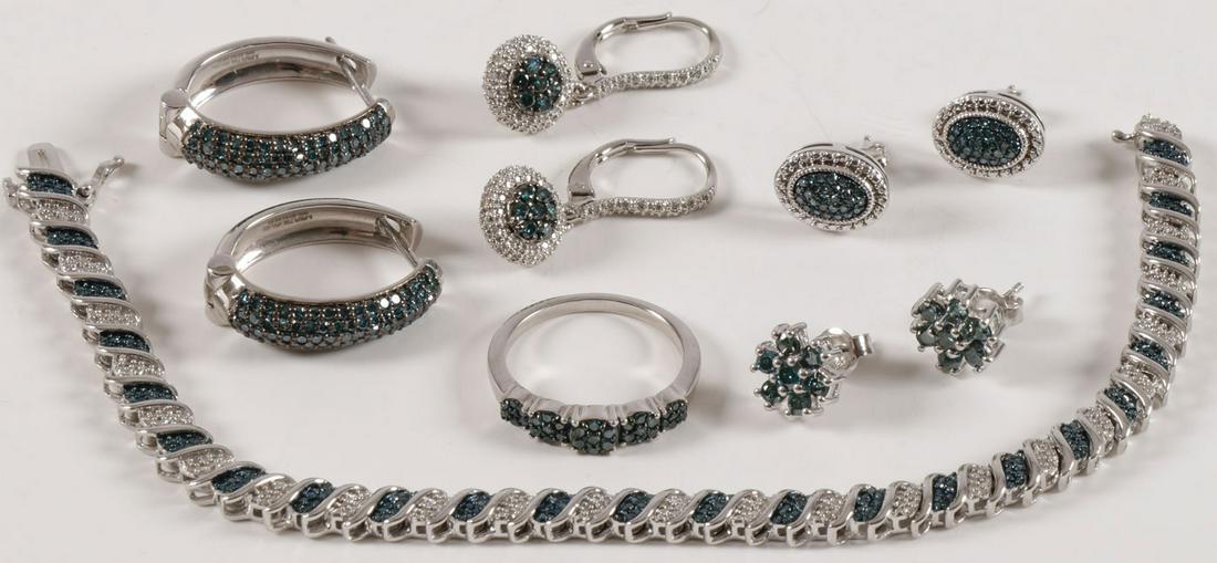 BEAUTIFUL SILVER & BLUE DIAMOND SET: BEAUTIFUL SILVER & BLUE DIAMOND SET. Comprising a beautiful matching group of jewelry set with miniscule blue color treated diamonds accented by white melee diamonds including a tennis bracelet, a rin
