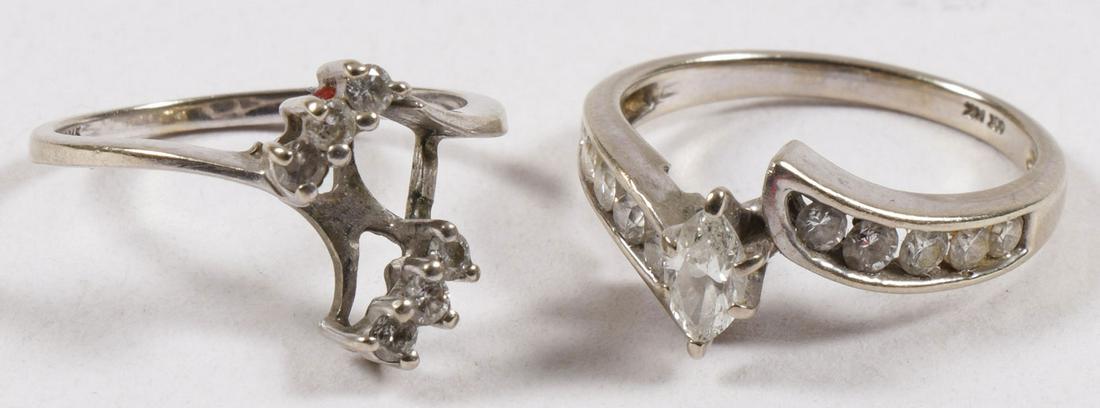 DIAMOND ENGAGEMENT RING WEDDING SET: DIAMOND ENGAGEMENT RING WEDDING SET. The 14 karat white gold engagement ring set with an approximate .35 marquise cut diamond, embellished with ten melee diamonds, the 14 karat white gold sleeve set w