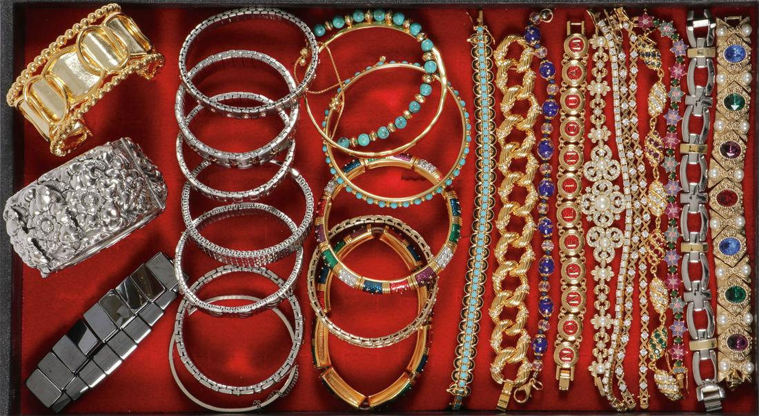 ATTRACTIVE DECORATIVE JEWELRY GROUPING: ATTRACTIVE DECORATIVE JEWELRY GROUPING. Comprising over 25 individual bracelets including slip on bracelets, tennis style bracelets, bangles and cuffs, with various decorative elements as shown. SHIPP