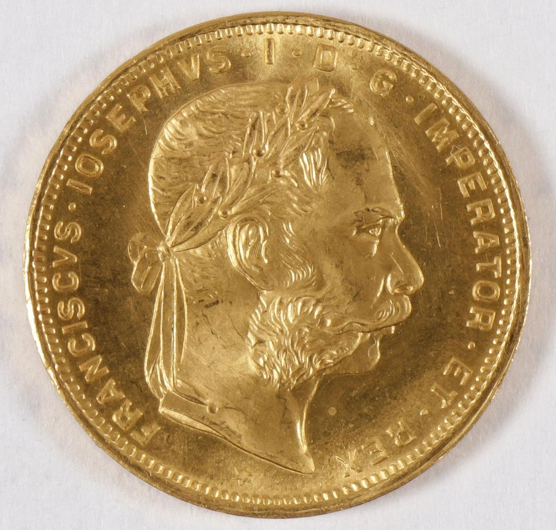 8 FLORIN/20 FRANCS GOLD COIN: 8 FLORIN/20 FRANCS GOLD COIN. Comprising an Austrian 8 florin 20 francs restrike dated 1892.SHIPPING NOTICE:Jackson's is your sole and only source for one stop packing and shipping. Wit