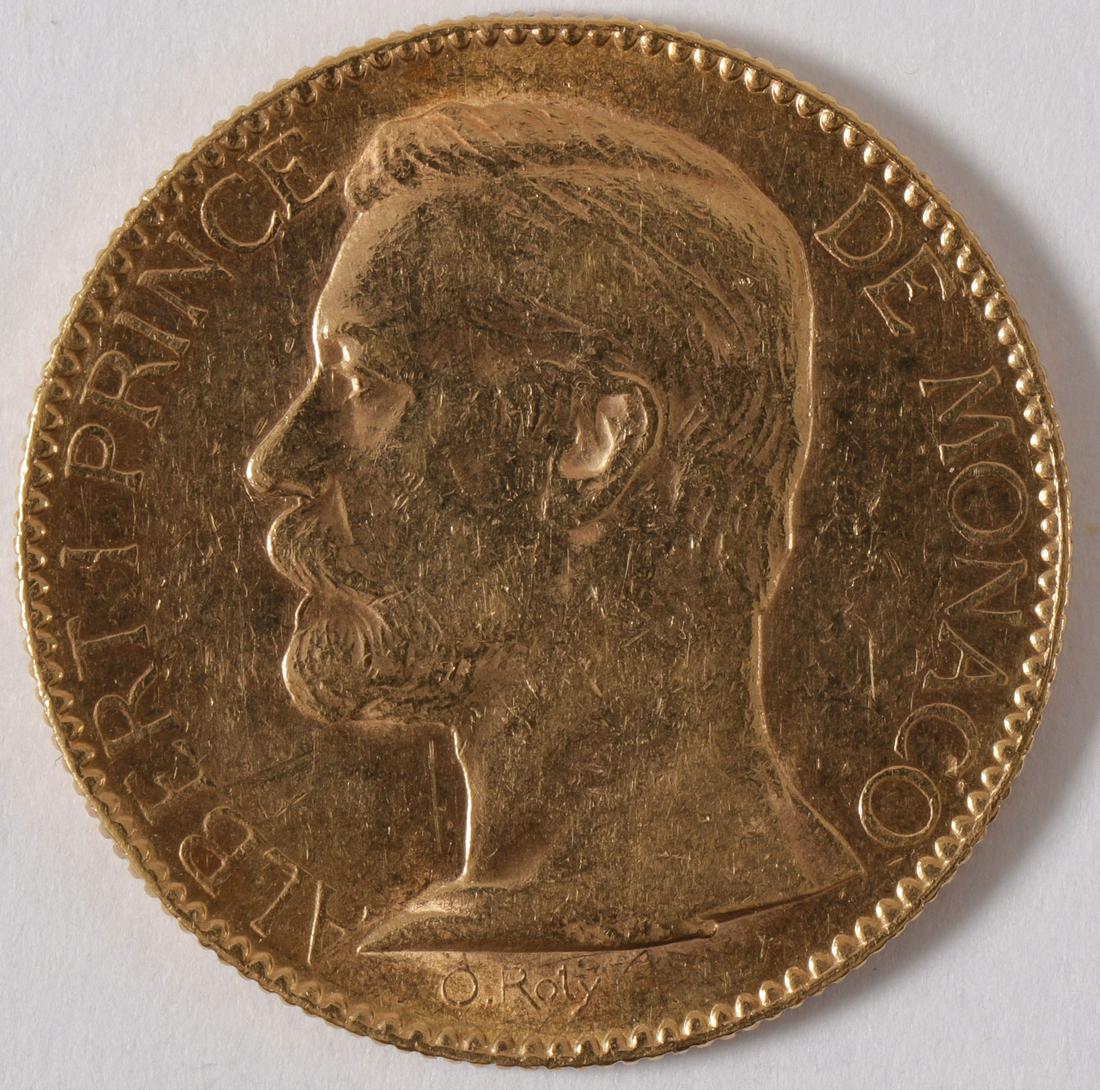 1891 100 FRANCS GOLD PIECE, MONACO: 1891 100 FRANCS GOLD PIECE, MONACO. Comprising a "Cent Francs" gold coin dated 1891. SHIPPING NOTICE: Jackson's is your sole and only source for one stop packing and shipping. With over