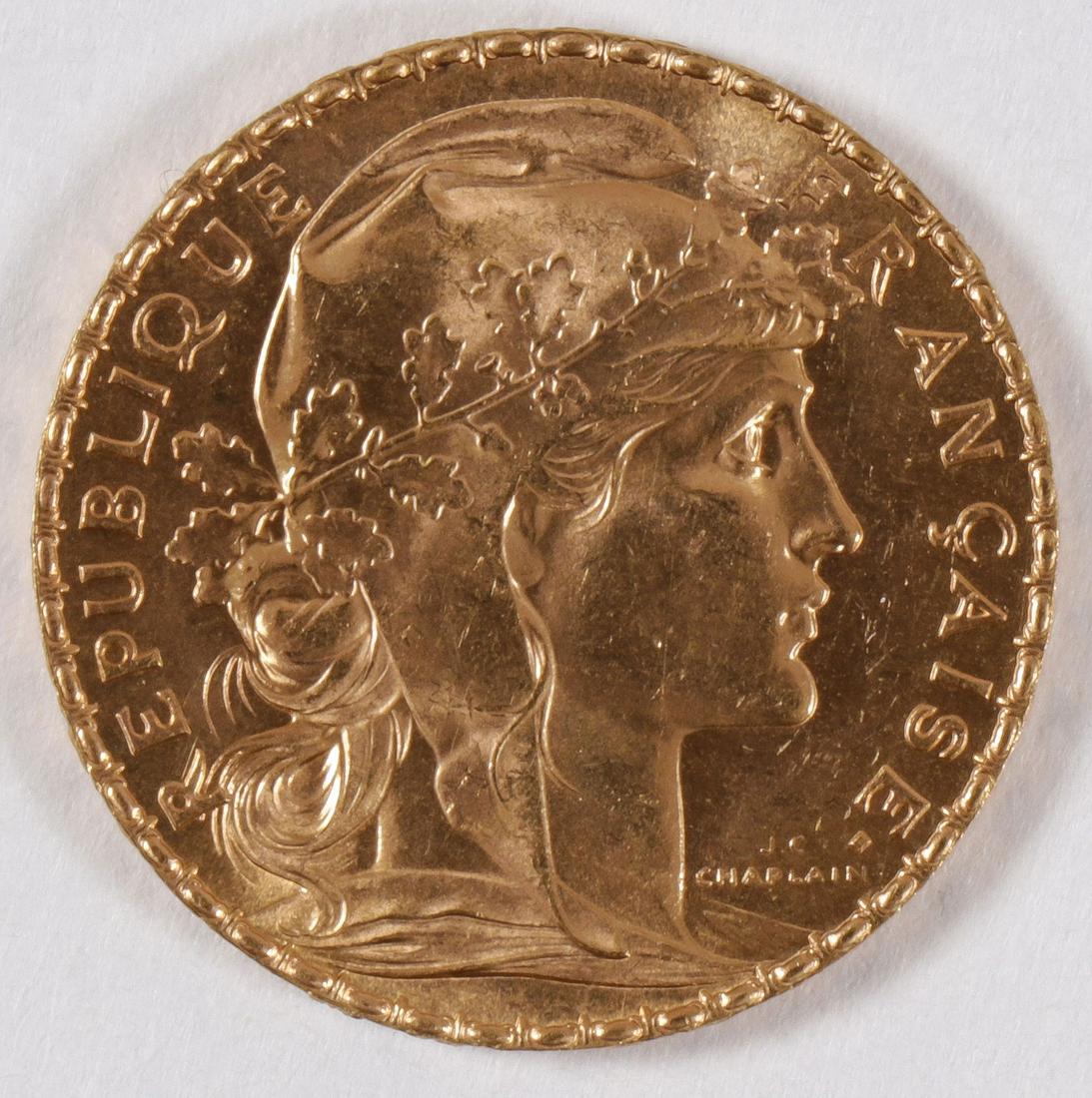 A 1908 TWENTY FRANCS GOLD COIN: A 1908 TWENTY FRANCS GOLD COIN. Comprising a French 20 francs coin dated 1908.SHIPPING NOTICE:Jackson's is your sole and only source for one stop packing and shipping. With over 50 year