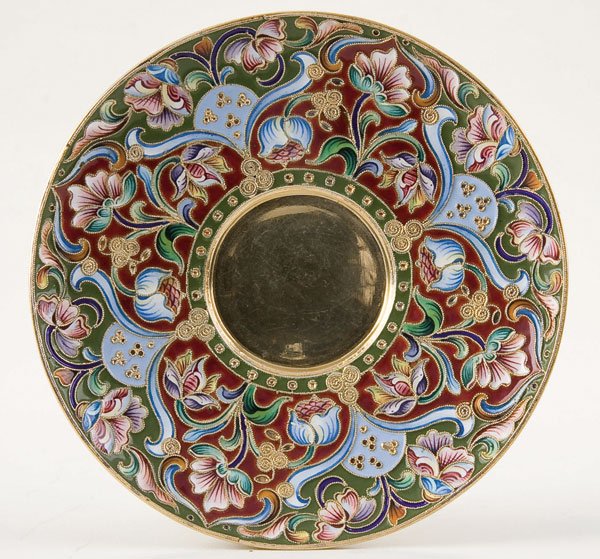 Russian silver-gilt and enamel saucer: A RUSSIAN SILVER-GILT AND SHADED ENAMEL SAUCER, Maria Semenova. Overall enameled with florals on a moss green and burgundy ground. Hallmarked Moscow 1908-1917, 84 standard and Cyrillic maker's mark ''