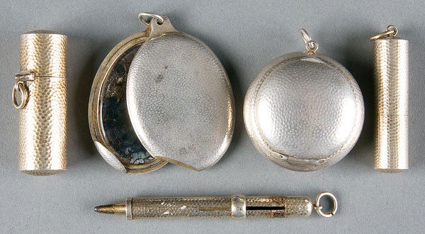 Russian silver cosmetic set: AN INTERESTING RUSSIAN SILVER 5-PIECE COSMETIC SET, Grachev. Comprising a compact, mirror with swivel lid, scent bottle, lipstick case and liner pencil. Each piece with matching hammered finish and at