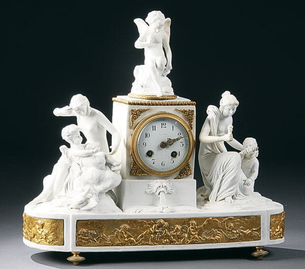 Louis XVI style mantle clock: A LOUIS XVI STYLE PARIAN & GILT BRONZE MANTLE CLOCK 19th century depicting various scenes with cupid above an embossed gilt bronze freize of putti, old restorations and minor losses. Length 16 inches.