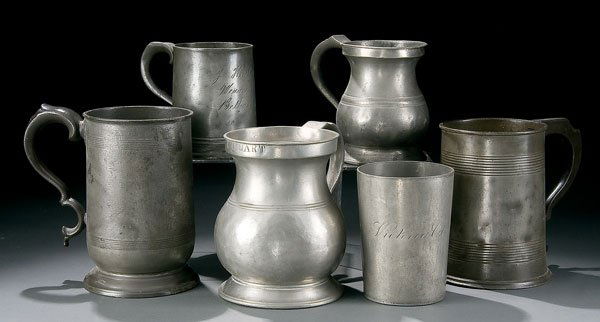 English Pewter Mugs: A 19TH CENTURY ENGLISH PEWTER MUG GROUP six pieces early to late century including a one quart with glass bottom, a one pint presentation, a ''James Yates'' hallmarked and a pint engraved ''Victoria C