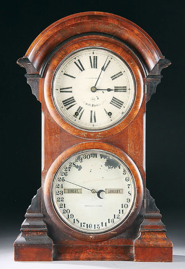 Seth Thomas Calendar Clock: A SETH THOMAS DOUBLE DIAL PARLOR CALENDAR CLOCK pat. 1875 & 1876, mahogany case with lower calendar dial for day, date & month.. Height 24.5 inches. Estimate $300-$500