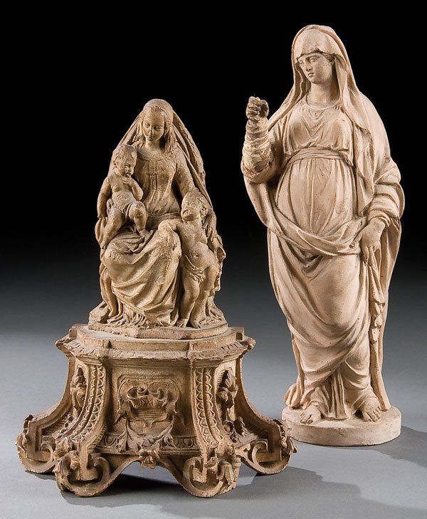 Religious figures, terra cotta Madonna: AN EARLY 19TH CENTURY TERRA COTTA FIGURE of The Virgin, probably Italian height 9 inches (23 cm) (illustrated on the right). Together with a molded plaster figure of the Madonna and Child with the inf